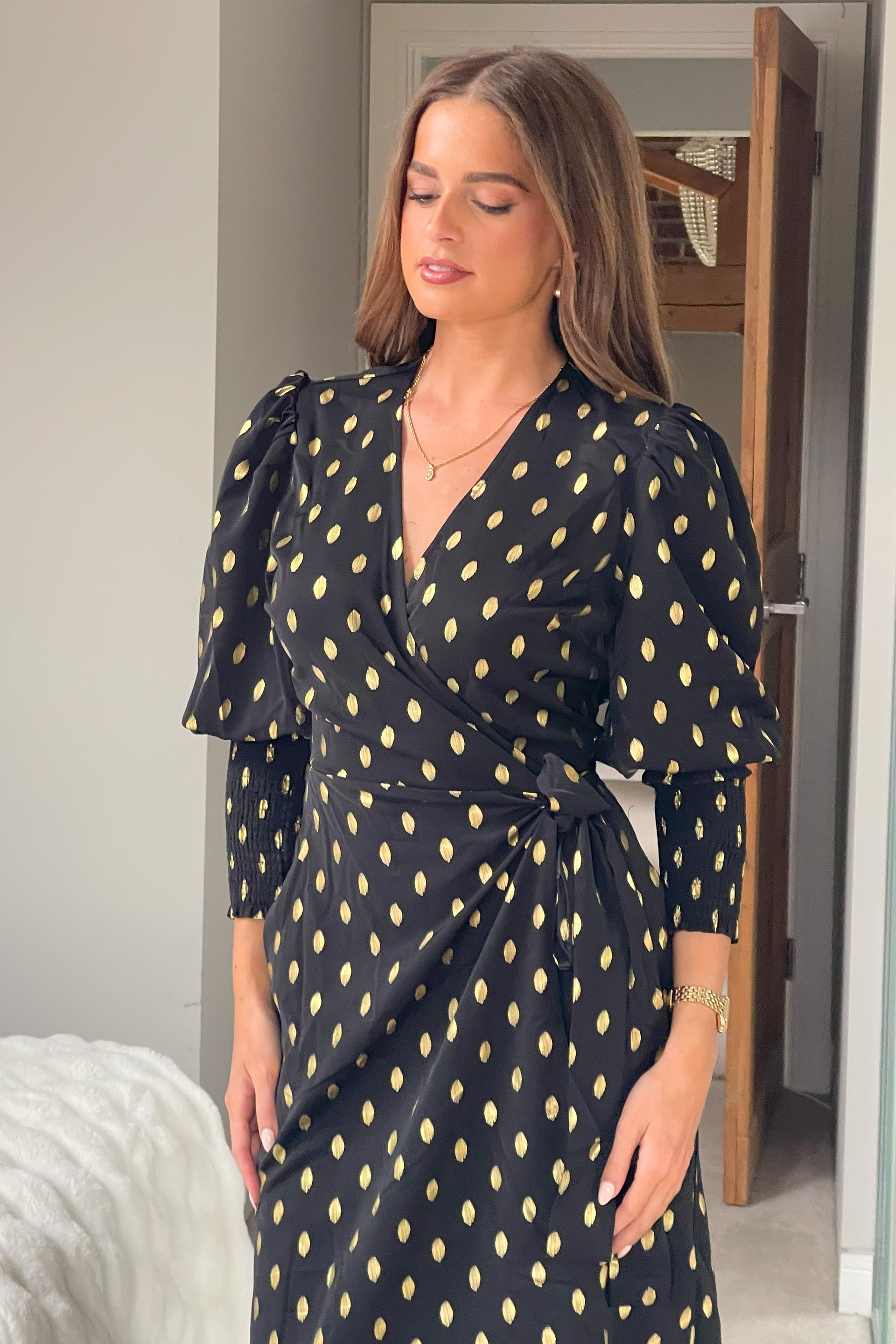 Devina Shirred Cuff Wrap Dress In Black And Gold Foil