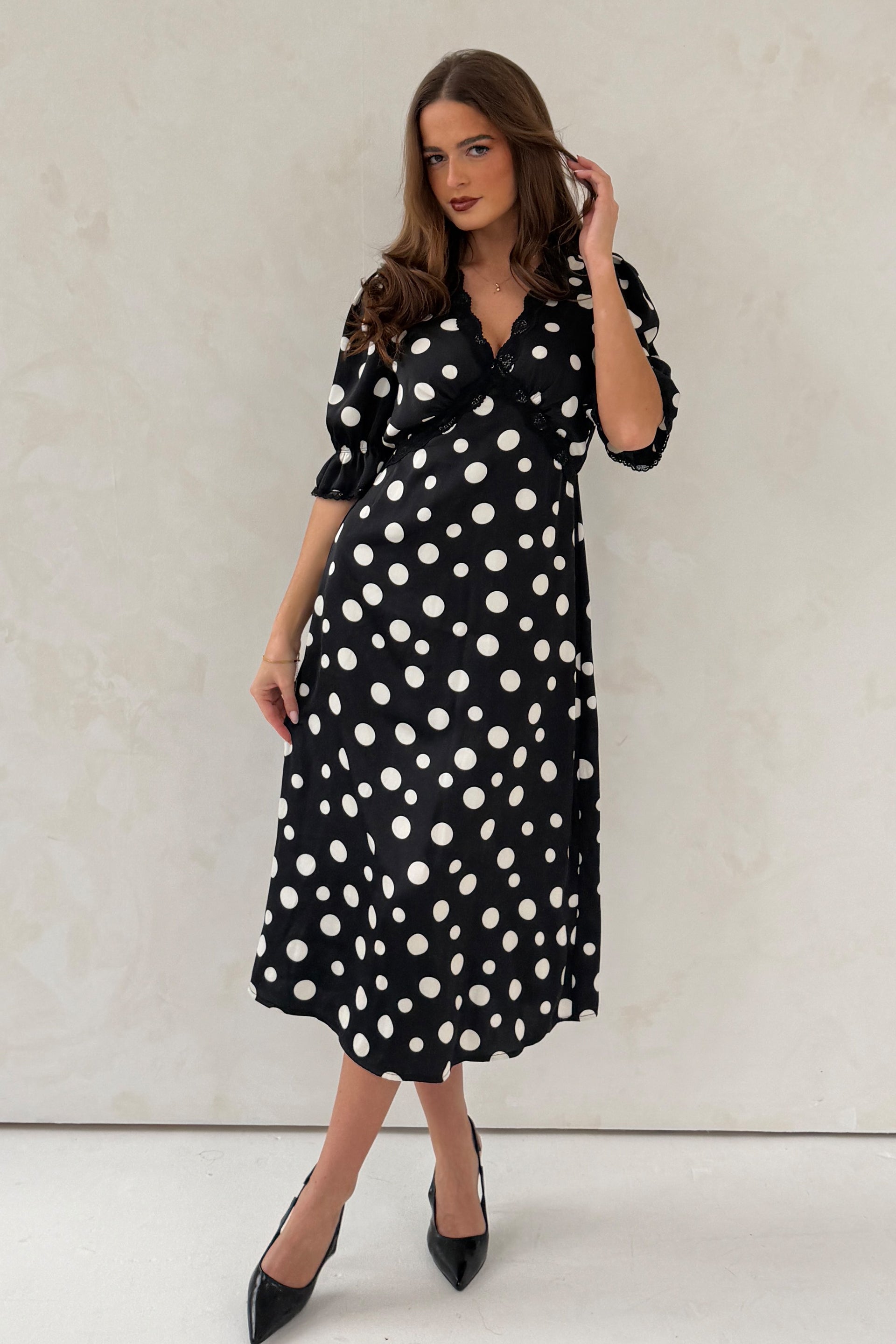 black polka dot dress with puff sleeves scout puff sleeve dress // polka dot *zoco exclusive* – shop zoco main image 1